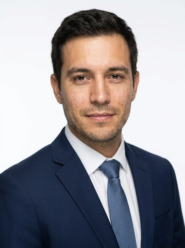 Navy suit, white backdrop